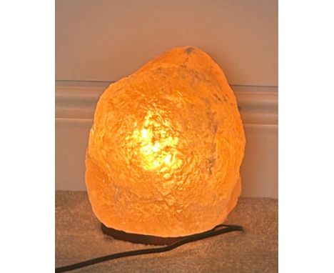 Rock salt lamp, in working order, approxiamte height 10 inches