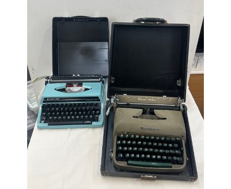 Two vintage type writers one Remington one Silver - reed