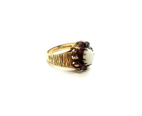 9ct gold Opal and garnet dress ring, missing one garnet, total weight 5.2 grams
