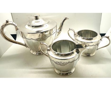 Silver plated teapot, creamer and sugar bowl