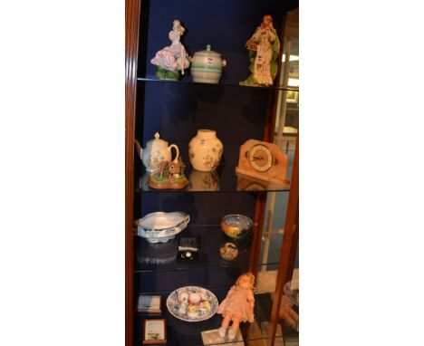 A quantity of porcelain and collectables, to include Art Deco mantel clock, vintage doll by 'Roddy', Poole biscuit barrel, Fr