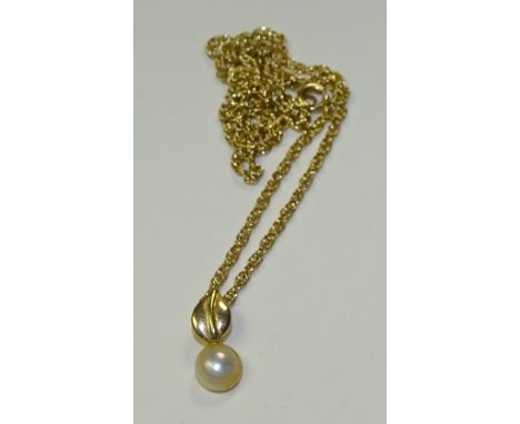 A 9ct gold pearl pendant on chain, the pearl mounted on leaf design pendant, 375 stamped to pendant, marks rubbed to clasp, 2