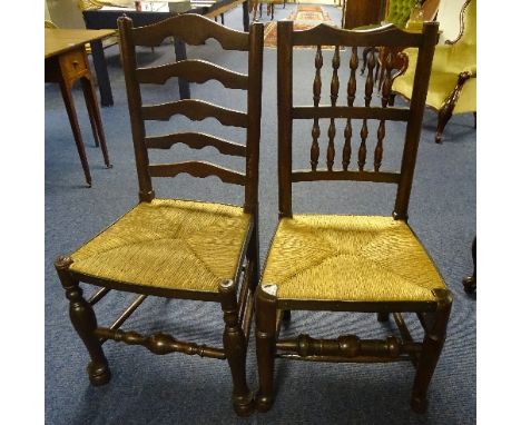 A harlequin set of six 18th century style country oak ladder back chairs, comprising of a set of four and a pair, with woven 