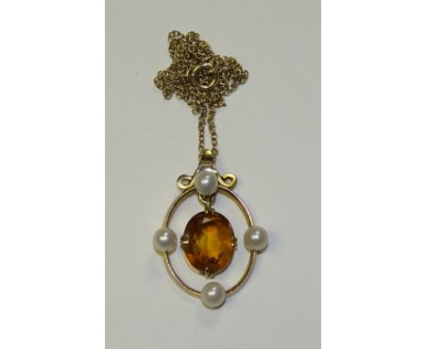 A 9ct gold citrine and pearl pendant, the central oval cut citrine drop surrounded by gold hoop with four pearls, on 9ct gold