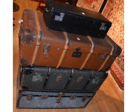 Three vintage travel trunks, two of wood bound design and one of metal casing, together with a vintage 1960's/70's picnic ham