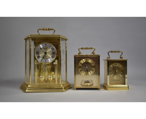 A Modern Battery Operated Pillar Clock and Two Brass Cased Carriage Clocks with Quartz Movements 