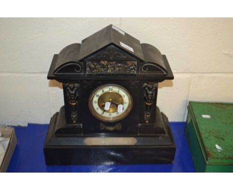 19th Century black slate clock with carved decoration