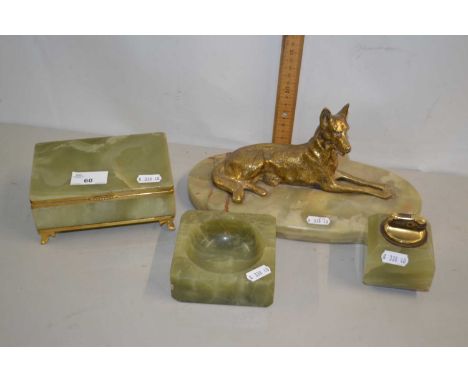 Group of onyx wares, cigarette box, lighter, model of a dog on oval onyx base