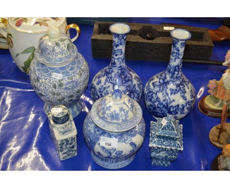 Further ceramic items including a pair of vases with printed blue and white decoration, further jar and cover and a tea caddy