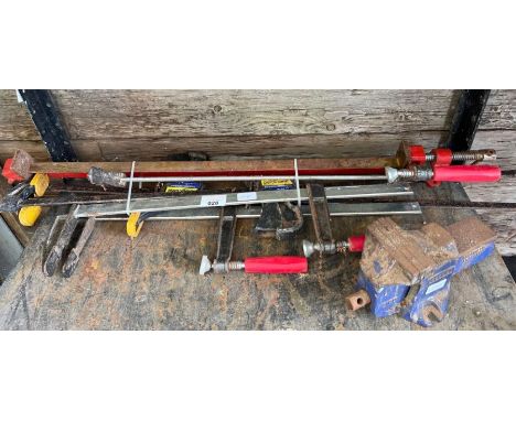 Various sash clamps along with a Record bench vice