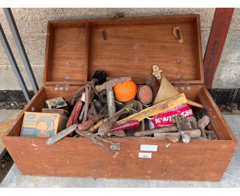 Wooden trunk containing hand tools 