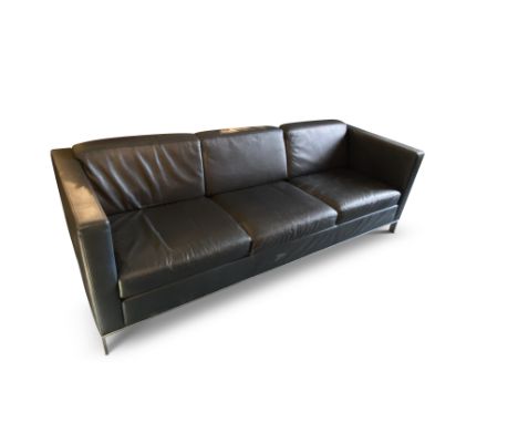 A Norman Foster Walter Knoll 500 dark navy leather three-seater sofa  On brushed steel legs, 217cm wide, 81cm deep, 71cm high