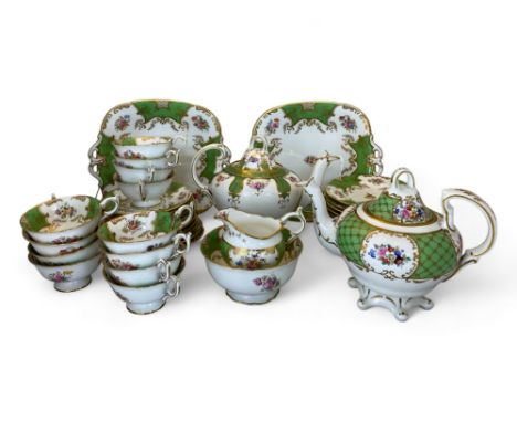 A Coalport green and floral decorated tea service
Comprising of two tea pots, two cake plates, twelve cups, a milk jug, a sug