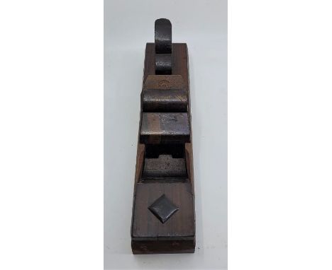 A steel panel plane, with figured rosewood infill, rosewood handle and Ward iron, with lozenge form strike button to front, s