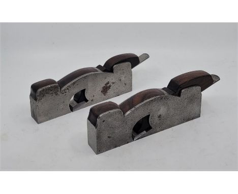 An iron shoulder plane, with rosewood infill and wedge and Preston iron, sole 8in. x 1 3/16in., together with a similar iron 