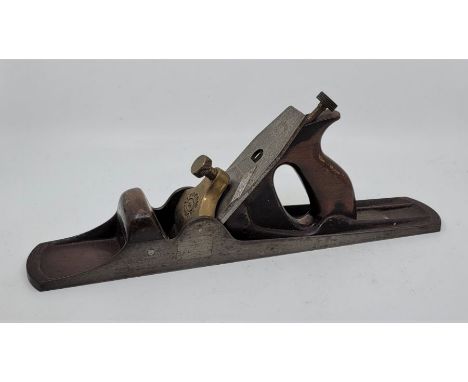 A Norris 16 1/4in. adjustable panel plane, with hardwood handle and Norris iron, adjuster stamped Norris patent details.Condi