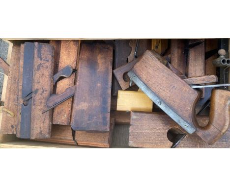 A trunk of wooden planes 