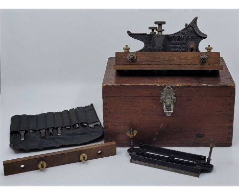 A Howkins Patent "Model C" plough plane, with cutters and spanner in box.Condition note: loss of japanning to plane body, 13 