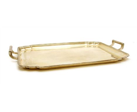 A silver twin handled tray of rectangular form, with scalloped corners and twin angular handles by Mappin and Webb, Sheffield