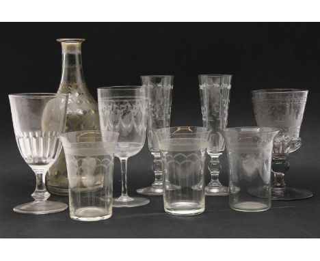 An 18th century Bohemian engraved glass cup, 15cm high, and engraved decanter and other glassware