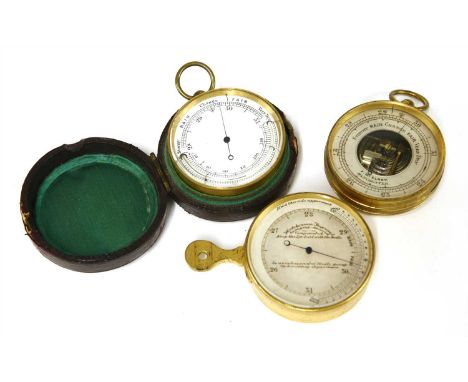 Three brass-cased pocket barometers, the first inscribed 'Hutchinson's Improved Surveying Aneroid, Compensated Keep the eye l