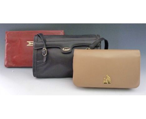 A Mappin &amp; Webb vintage red leather envelope clutch bag, with gold tone hardware and sectioned interior, a Gucci vintage 