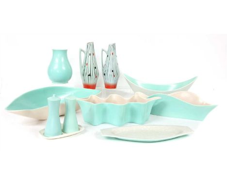 A collection of Poole dishes , and a condiment set, Villeroy and Boch cups and saucers, and a pair of jugs