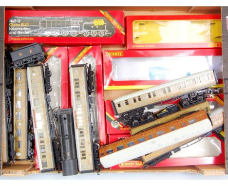 Tray containing Hornby R150 class B12/3 engine and tender, wartime NE black (G-BG), R25 LNER clerestory coach (G-BG), 5 1st s
