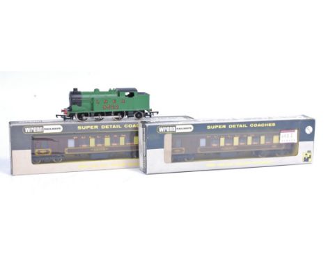 A LNER green 0-6-2 tank engine (G) together with Wrenn W6000 Pullman brake second Car No. 77 (G-BG) and another as 80 renumbe