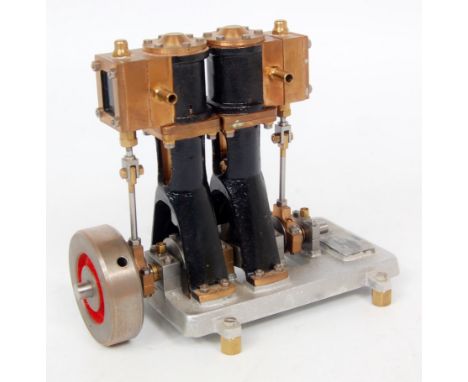From Reeves Casting's and built to a later development of Edgar T Westbury's designs, a twin cylinder vertical stationary ste