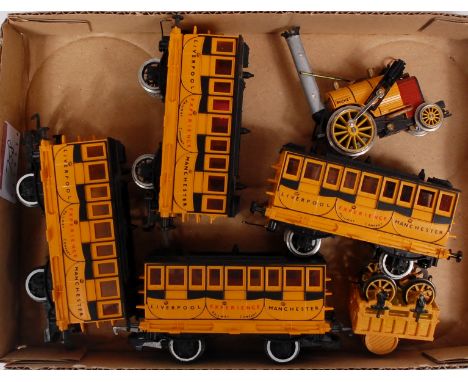 A Hornby 'Rocket' engine and tender together with a coach 'Experience', couplings changed for hook and wire loop (G), and 3 o
