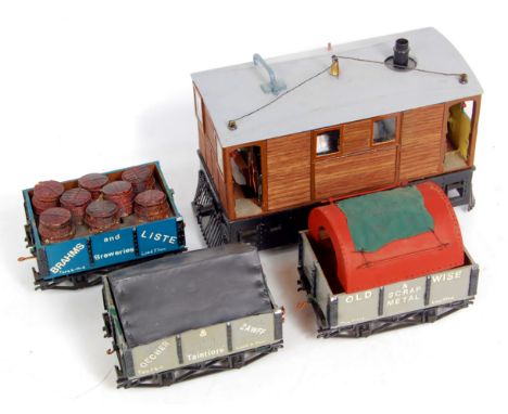 2.5 inch gauge electric model of The Wisbech & Upwell tram engine with single can motor plus 3 various wagons in 0 gauge, plu