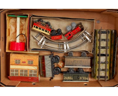 A large tray of assorted items including Hornby viaduct with ramps (F), No. 1 signal cabin (P), Chad Valley water tank (G-BG)