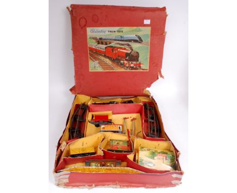 Brimtoy BR Goods Set comprising c/w black 0-4-0 loco No.67040 with 4 wheel BR Tender, open wagon, side tipper and BR Brake Va