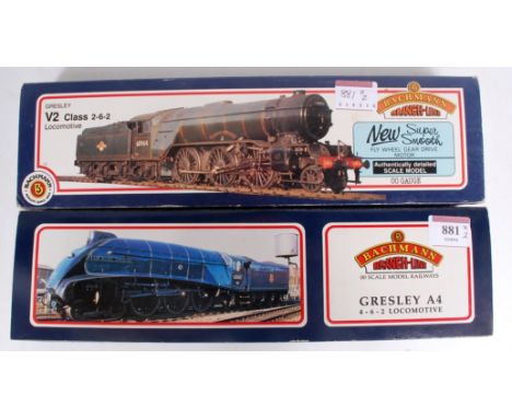 A Bachmann 31-553A BR black class V2 engine and tender (G-BG) together with 31-955 BR lined green class A4 engine and tender 