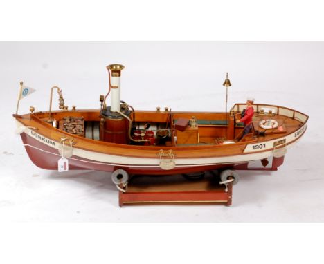A well made spirit fired steam launch titled "Borkum", measuring 35" in length and 13" across the beam, this model is made fr