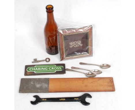 Mixed Railwayana to include LMS Hotels Brown Bottle, 3 SR Hotel Spoons, LNWR Splint, LNER Spanner (Repainted), Framed GER Cap