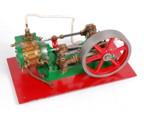 Stuart Turner No.9 horizontal single cylinder mill engine, comprising of wooden lagged horizontal cylinder with drain cocks, 