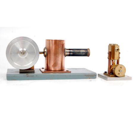 Scratch built horizontal hot air engine, comprising of single cylinder with stirling cycle, powering a small flywheel, free r