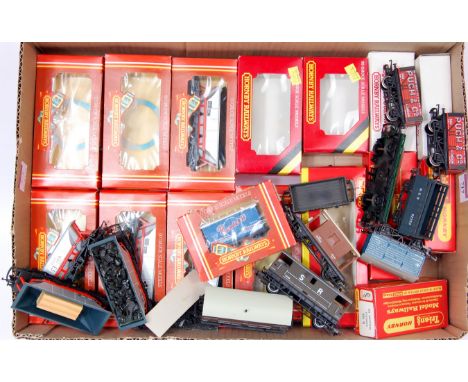 16 boxed mainly Hornby wagons including 6 R249 MGR hopper wagons with added loads (G-BG), R780 BR blue parcels wagon, R019 pl