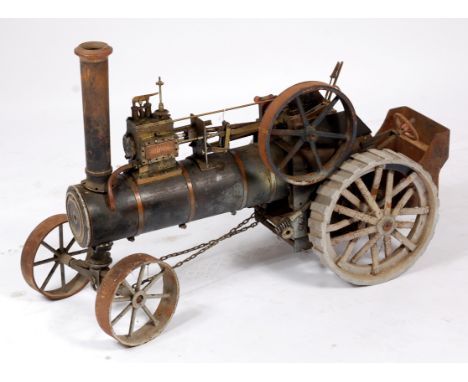 A part complete 2? inch scale Wallis and Stephens Field Traction Engine, sold as seen, missing boiler, chimney loose but appa