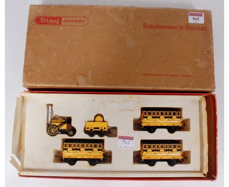 A Triang Hornby 'Stephensons Rocket' train pack containing engine and tender and Times, Experience and Despatch coaches in po
