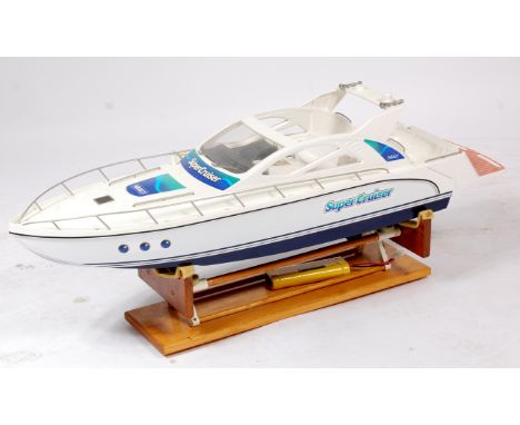 Nikko 1/22 scale radio control model of a "Super Cruiser", constructed from plastic and fibre glass, measuring 32" in length 