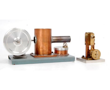 Scratch built horizontal hot air engine, comprising of single cylinder with stirling cycle, powering a small flywheel, free r
