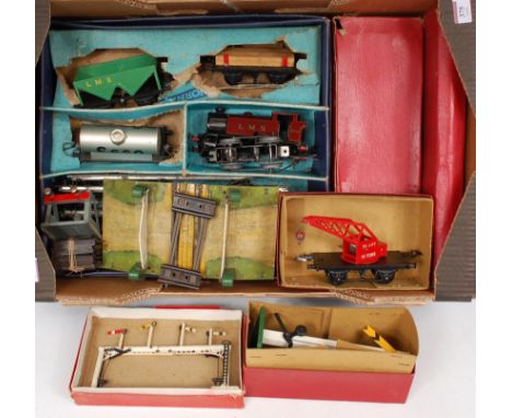 A large tray of postwar Hornby including box for LMS 101 tank goods set containing c/w loco - spring and mechanism detached f