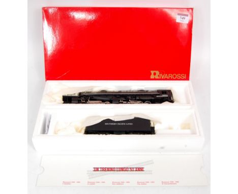 A Rivarossi H0 cab Forward Southern Pacific Lines 4-8-8-2 engine and tender (NM-BNM)