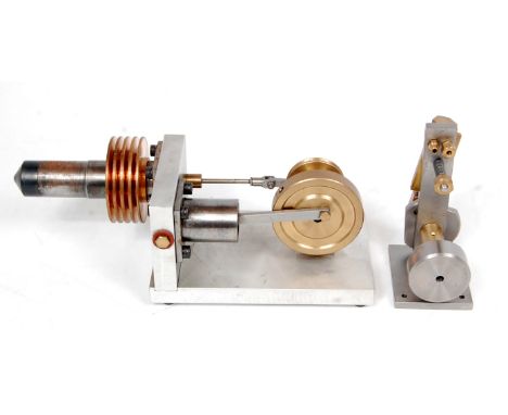 A propriety built from brass and steel construction hot air stirling cycle engine, fitted with a small 1.5 inch take off pull