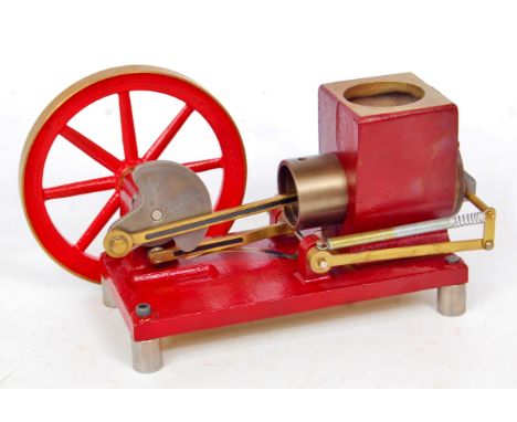 A well engineered Scott Vacuum (Flame Gulper) stationary engine, comprising of single cylinder driving crankshaft to power a 