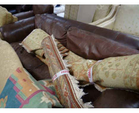 Large three-seater chocolate brown leather sofa 