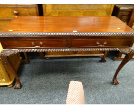 A reproduction carved side table with two drawers